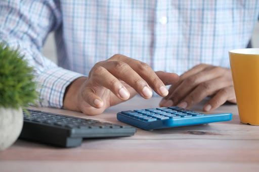 typing on calculator